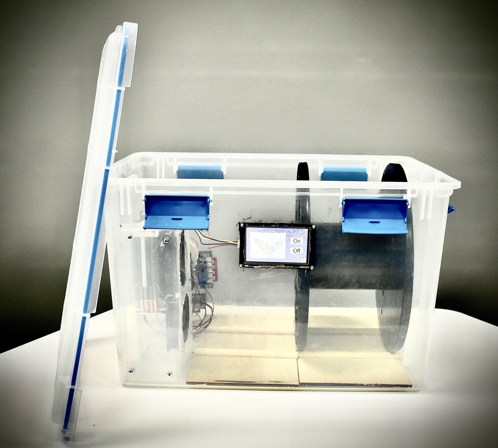 Side view of the re:store enclosure showing the control board, wiring and dehumidification hardware inside